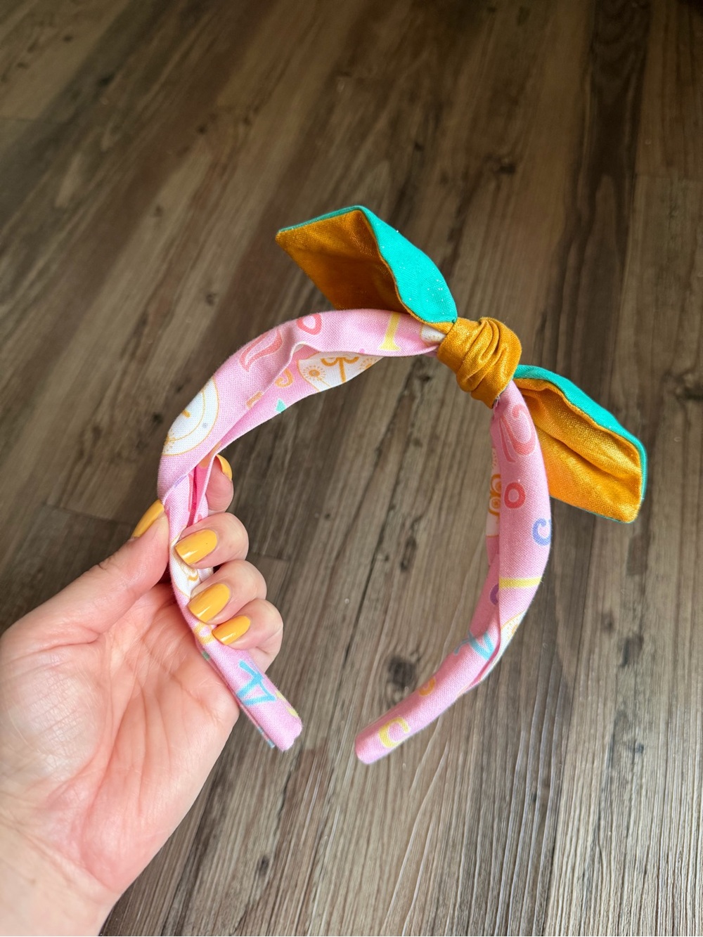Like New it’s a small world Pastel Headband